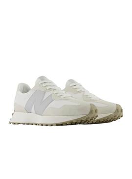 Chaussures New Balance 327 blanches et grises pour femme.