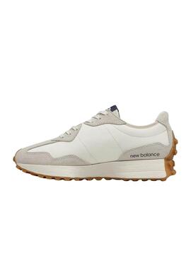 Sneakers New Balance 327 blanches et bleues pour femmes.