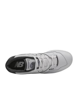 Chaussures New Balance 550 blanches et noires pour homme.