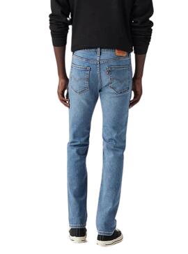 Pantalon en jean Levis 511 de couleur denim moyen pour homme.