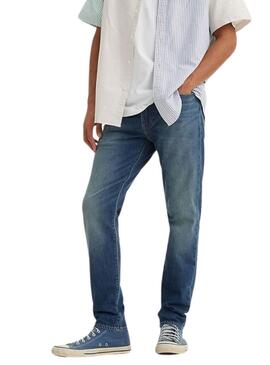 Jean Levi's 512 mid wash denim pour homme.