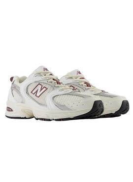 Baskets New Balance 530 blanches et bordeaux pour femme