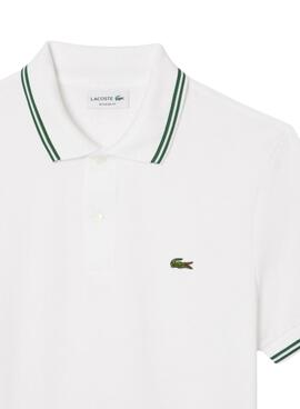 Polo Lacoste L.12.12 blanc à rayures vertes pour homme.