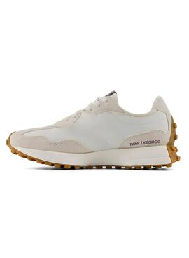 Sneakers New Balance 327 beige et violet pour femme.