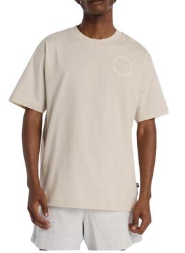 Maillot New Balance logo circulaire beige pour homme