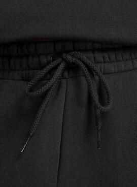 Pantalon New Balance Reimaginé noir pour femme.