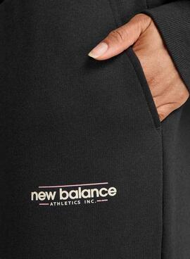 Pantalon New Balance Reimaginé noir pour femme.