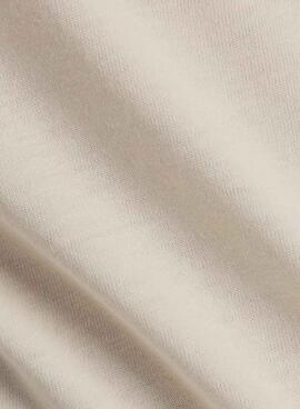 T-shirt New Balance Reimagined beige pour femme.