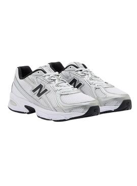 Chaussures New Balance U740 blanc et noir pour femme