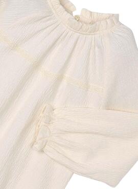 T-shirt Mayoral en punto de bambula beige para niña.