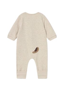 Barboteuse Mayoral avec des appliques brodées beige pour bébé.