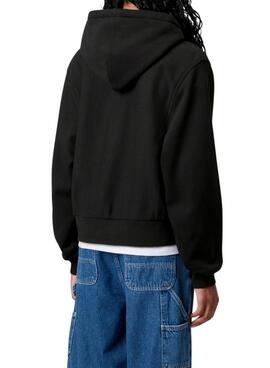 Sweat à capuche zippé Carhartt noir pour femme.