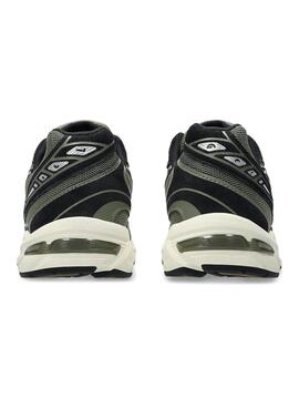 Baskets Asics Gel 1130 vertes et noires pour homme.