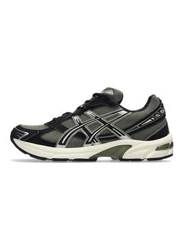 Baskets Asics Gel 1130 vertes et noires pour homme.