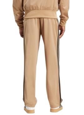 Pantalon Adidas Firebird chameau pour homme.