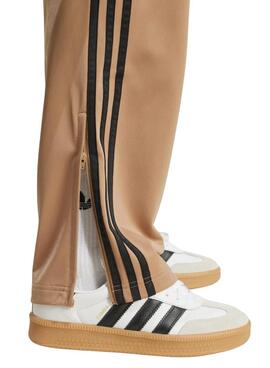 Pantalon Adidas Firebird chameau pour homme.