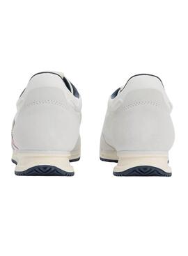 Chaussures Tommy Jeans Retro Runner Cleated blanches pour homme.