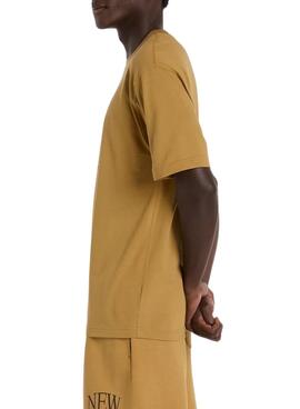 T-shirt New Balance Logo moutarde pour homme