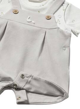 Ensemble effet salopette beige avec t-shirt blanc imprimé pour bébé.