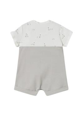 Ensemble effet salopette beige avec t-shirt blanc imprimé pour bébé.